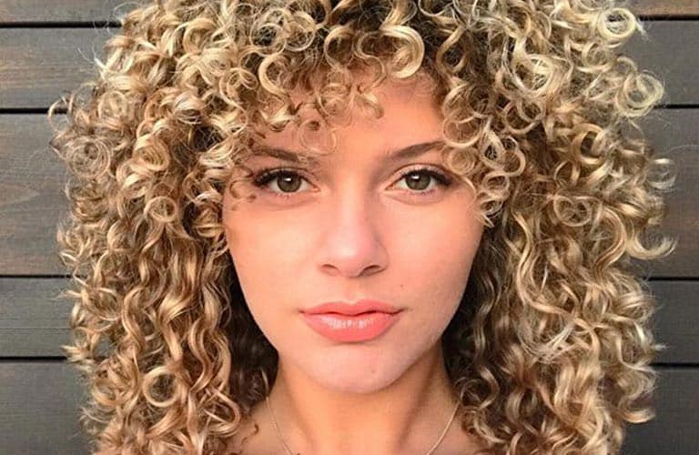 The Ultimate Guide to Diffusing Your Curly or Wavy Hair | Aveda